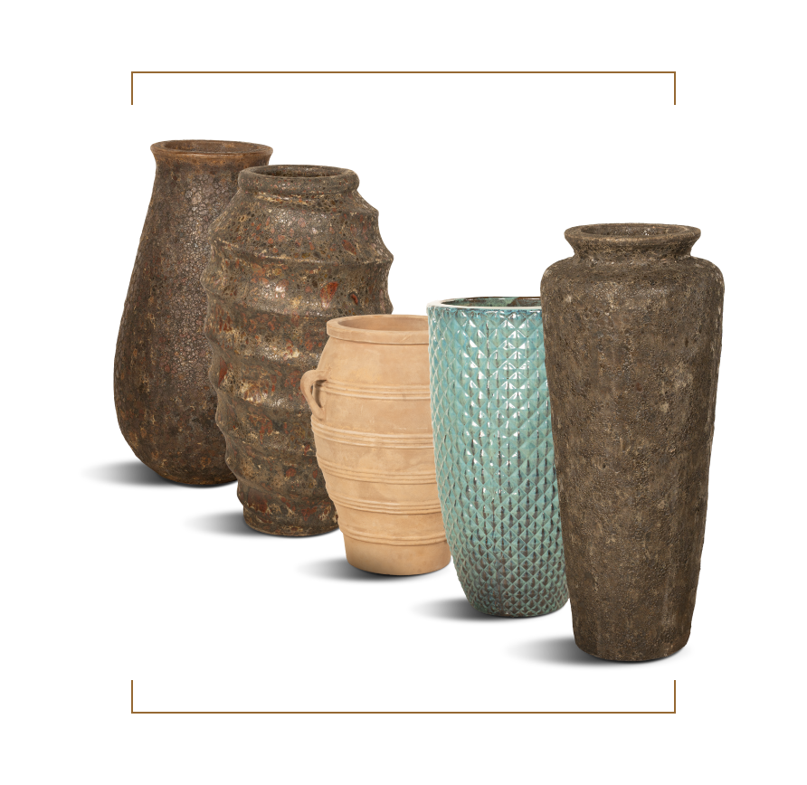 Five tall decorative vases in a row, each with a unique texture and finish.